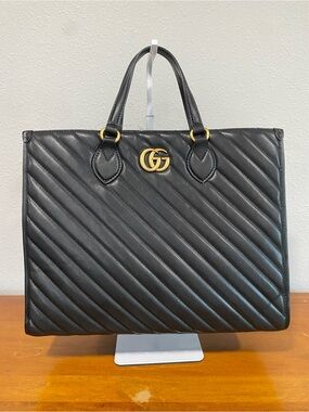 Black Quilted Leather Top-Handle Tote with Gold Hardware